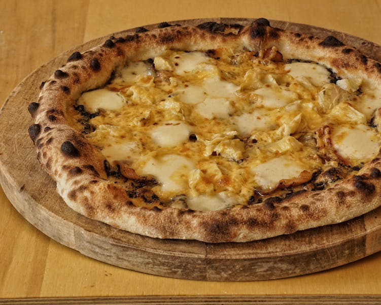 Authentic Italian wood-fired oven at the heart of Punch Pizza